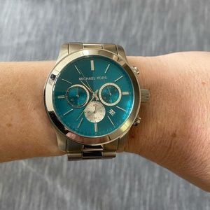 Silver metal Michael Kors watch with colored face